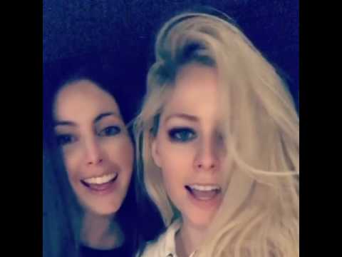 Funny Avril Lavigne Singing Umbrella with her sister - YouTube